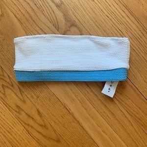 white and blue strapless swim top